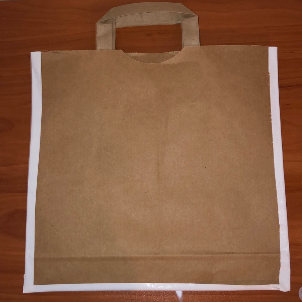 Brown paper (reusable) bag.